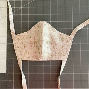 100% cotton mask with flannel backing.